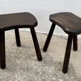 Pair of vintage stained wood tripod stools from the 1970s