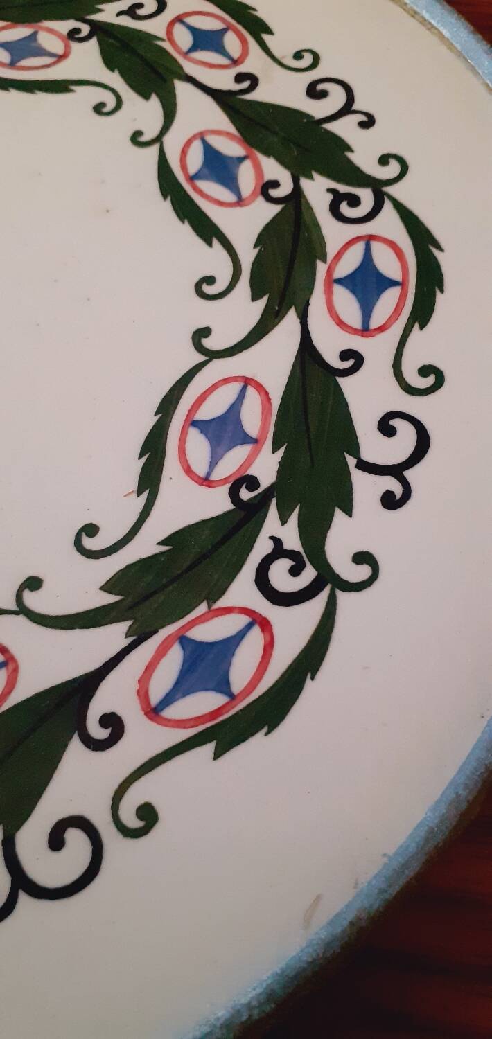 Porcelain and zinc trivet circa 1900