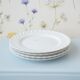 4 small Haviland plates in white porcelain