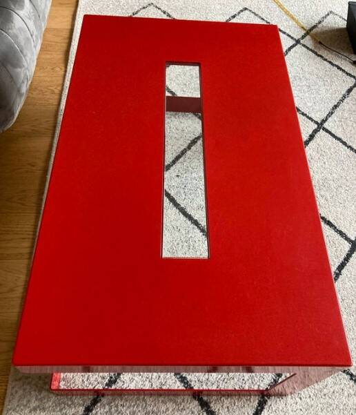 Red metal architect coffee table