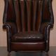 Victorian leather canapé and armchair, barrel back, circa 1860, restored.