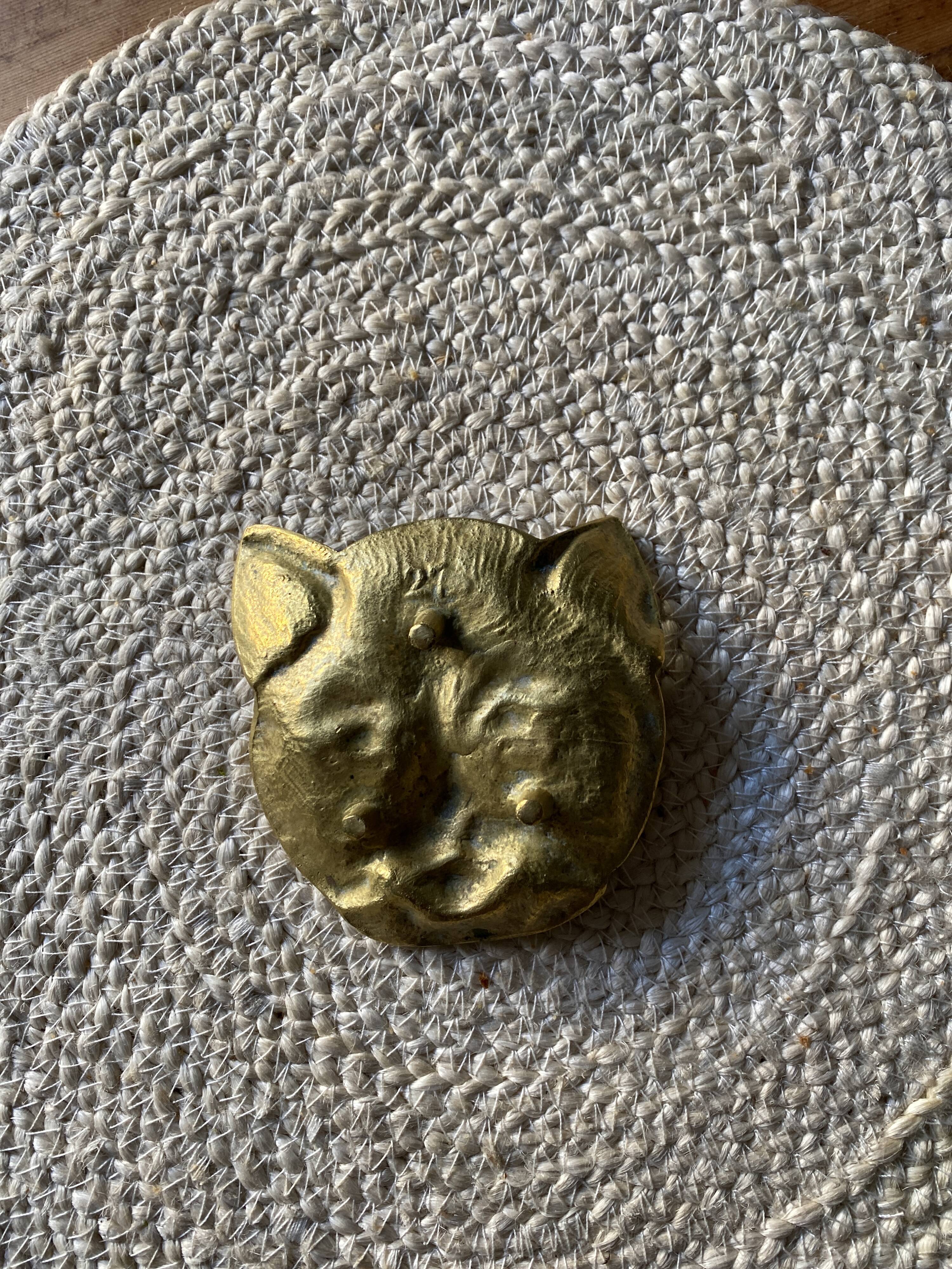 Brass cat's head
