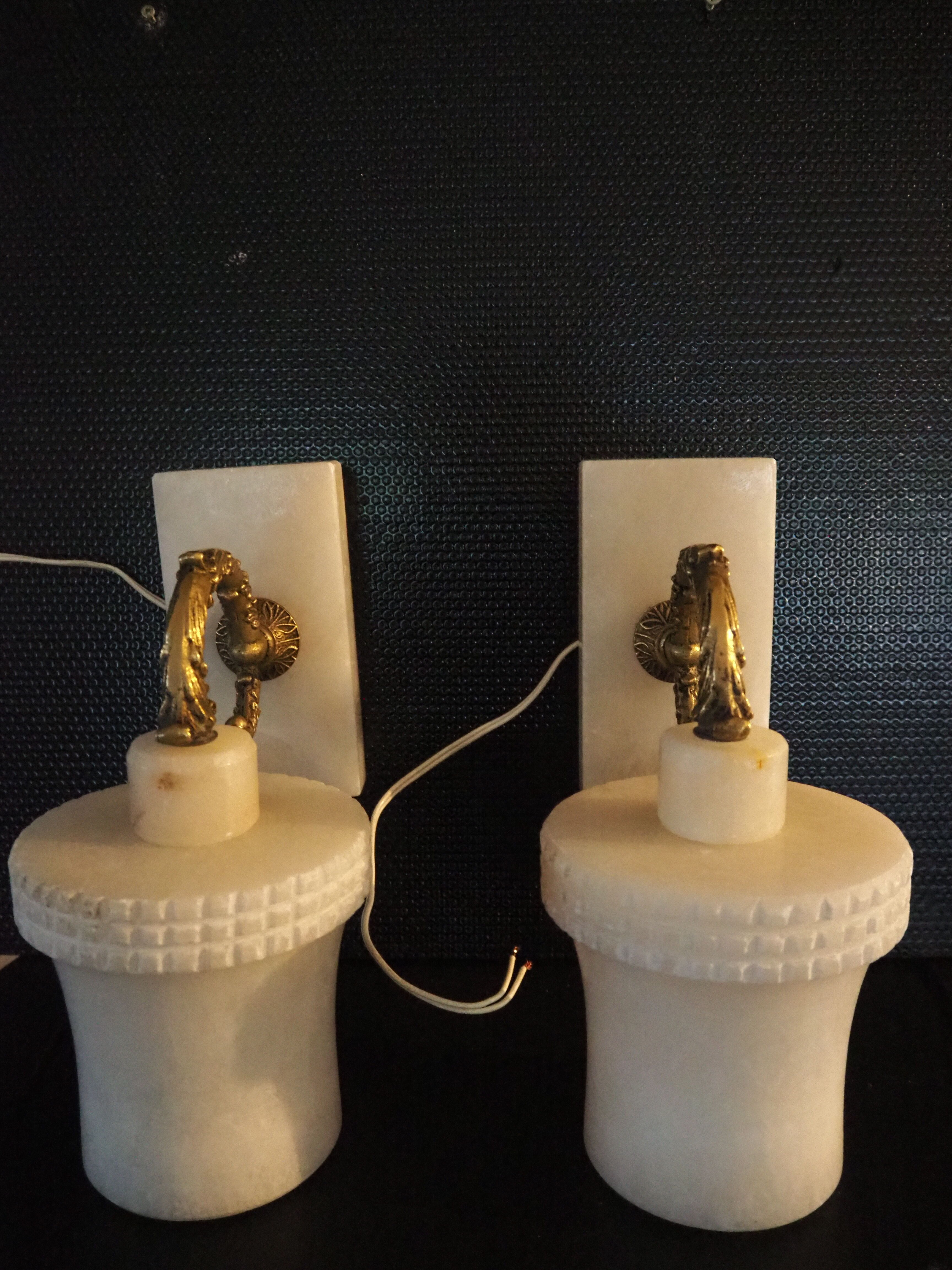 Pair of curved alabaster and bronze appliques