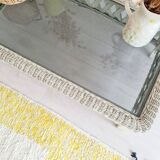 White rattan coffee table with glass top