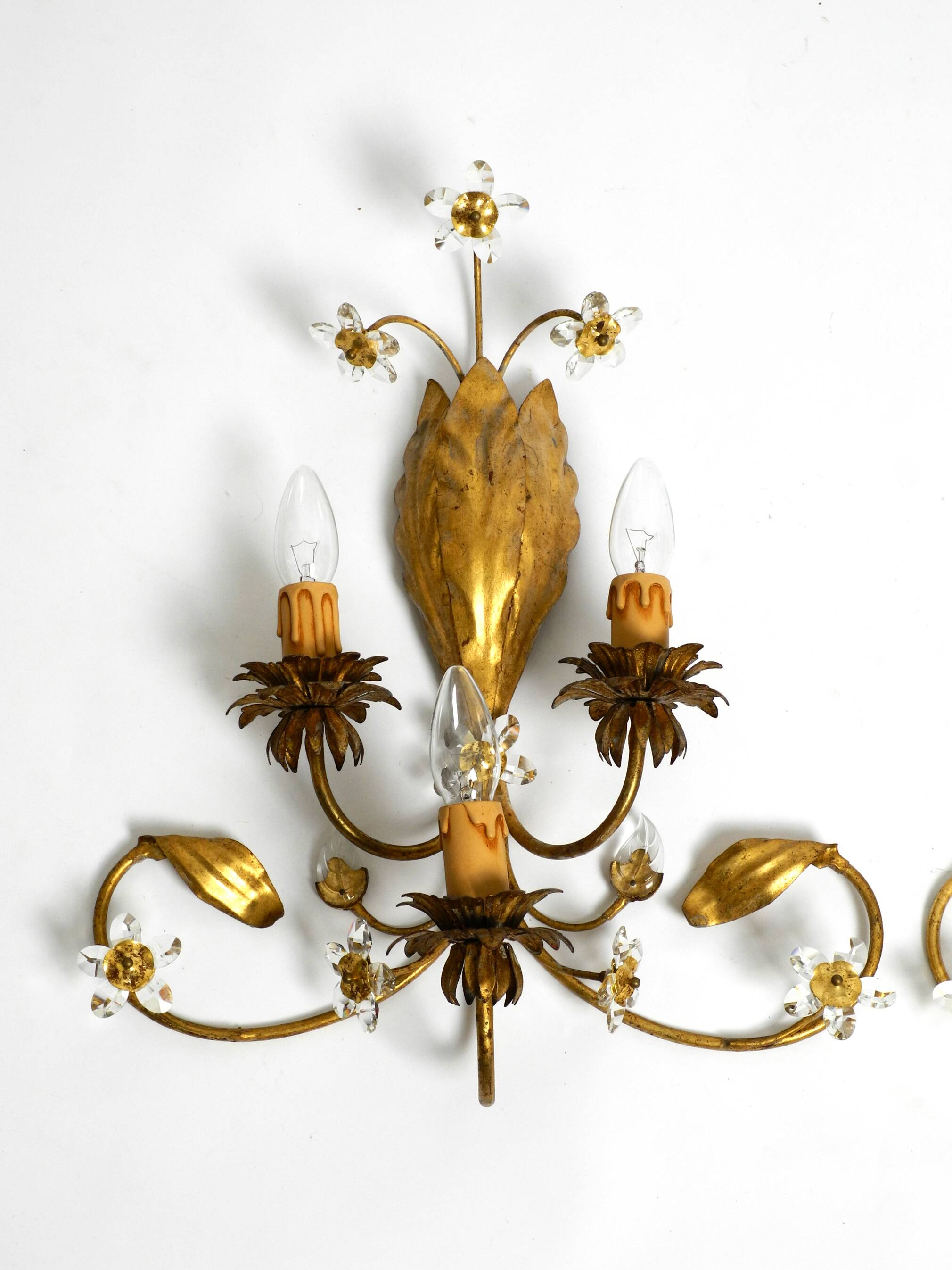 Pair of gold plated Italian 1980's floral Regency Murano glass sconces