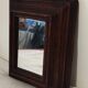Small mirror with its solid oak frame