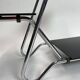 Chrome tubular flower stand by Emile Guyot