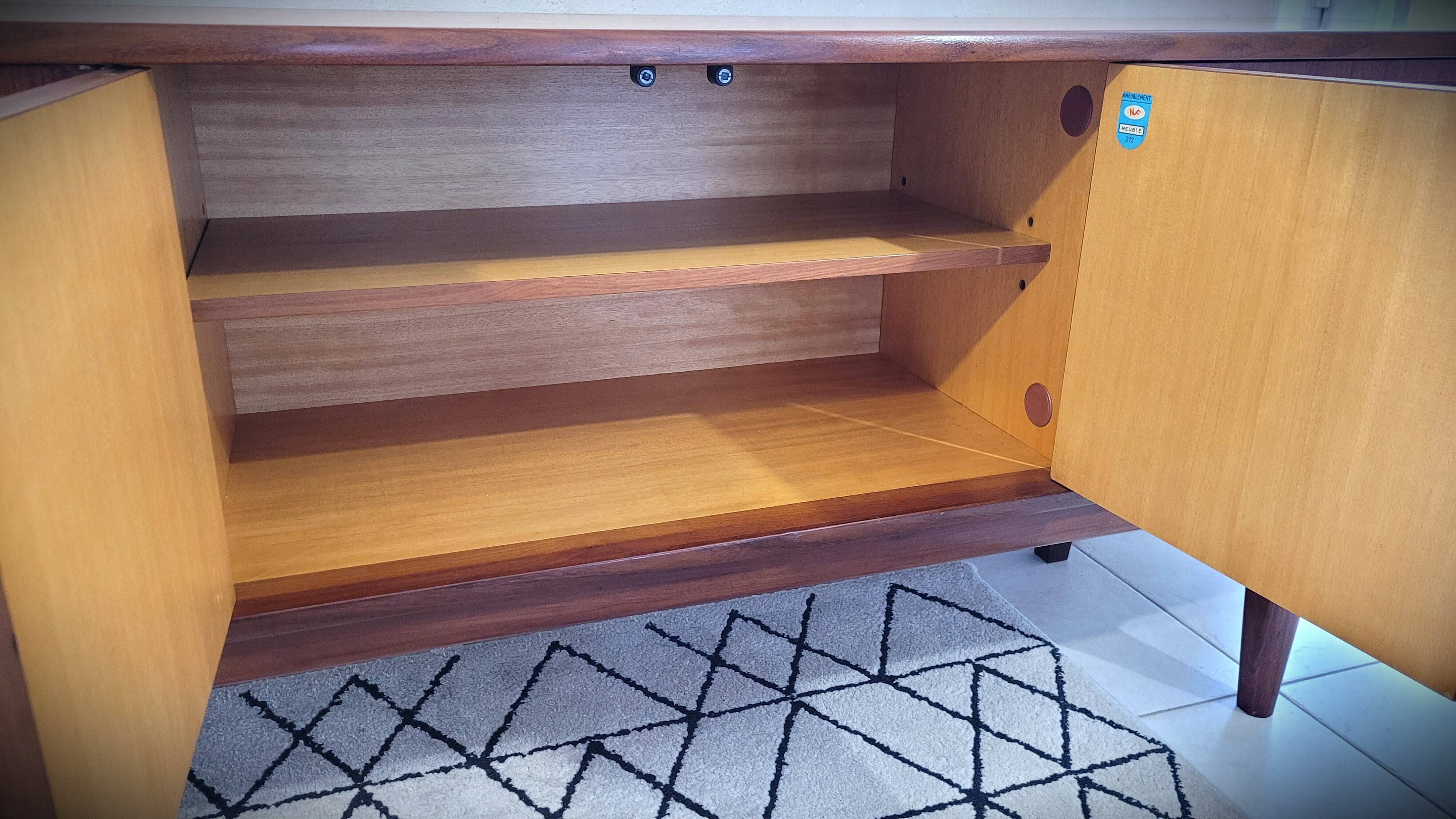 Scandinavian enfilade design in teak from the late 1960s.