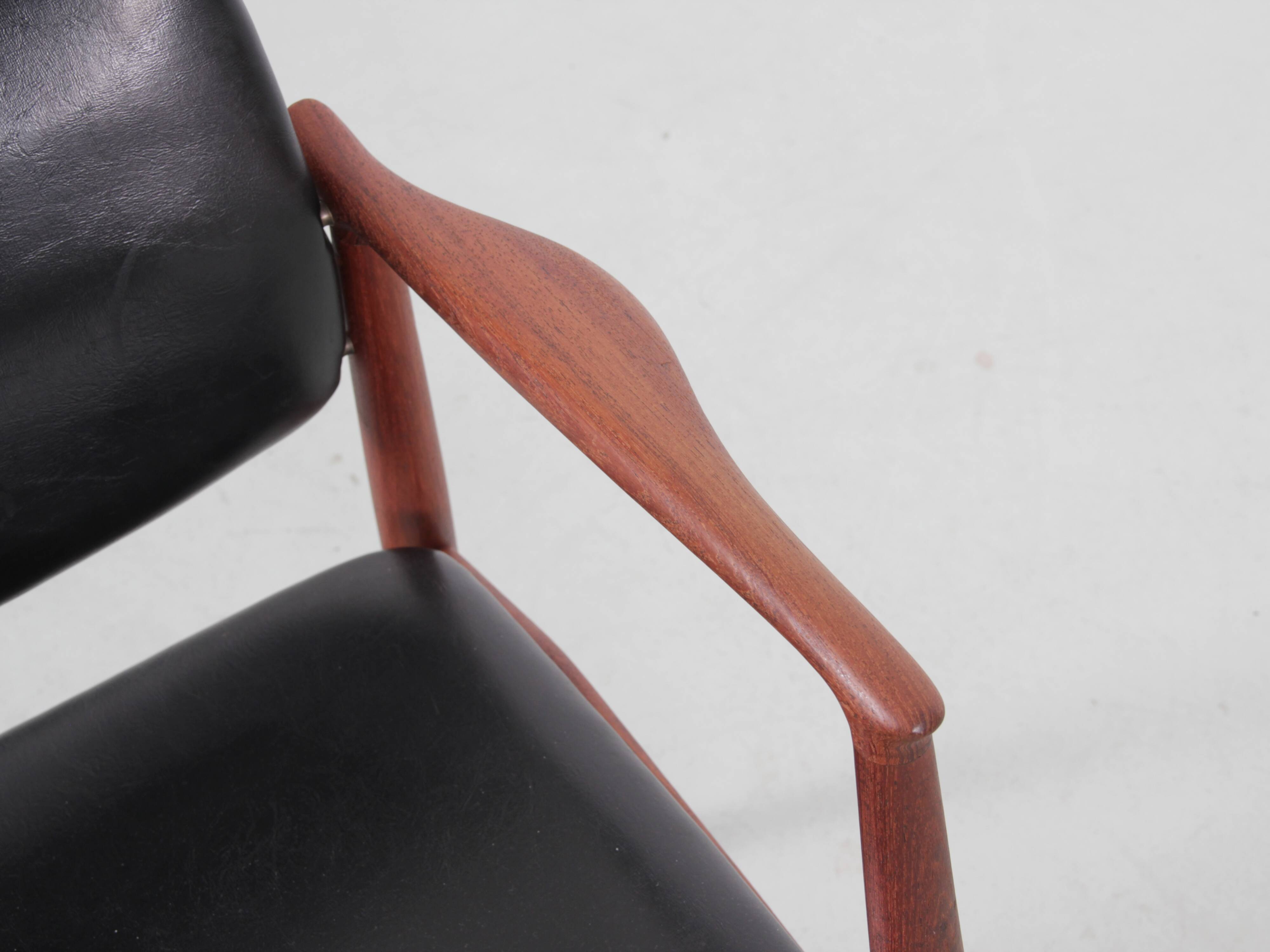 Pair of Scandinavian teak armchairs, model 66