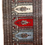 Tapis vintage fait main Bukhara de prière en laine rouge (45cm x 101cm)