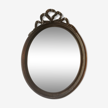 Miroir ovale style Louis XVI en plâtre doré