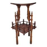 Antique pedestal table in Asian Japonese style.