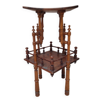 Antique pedestal table in Asian Japonese style.