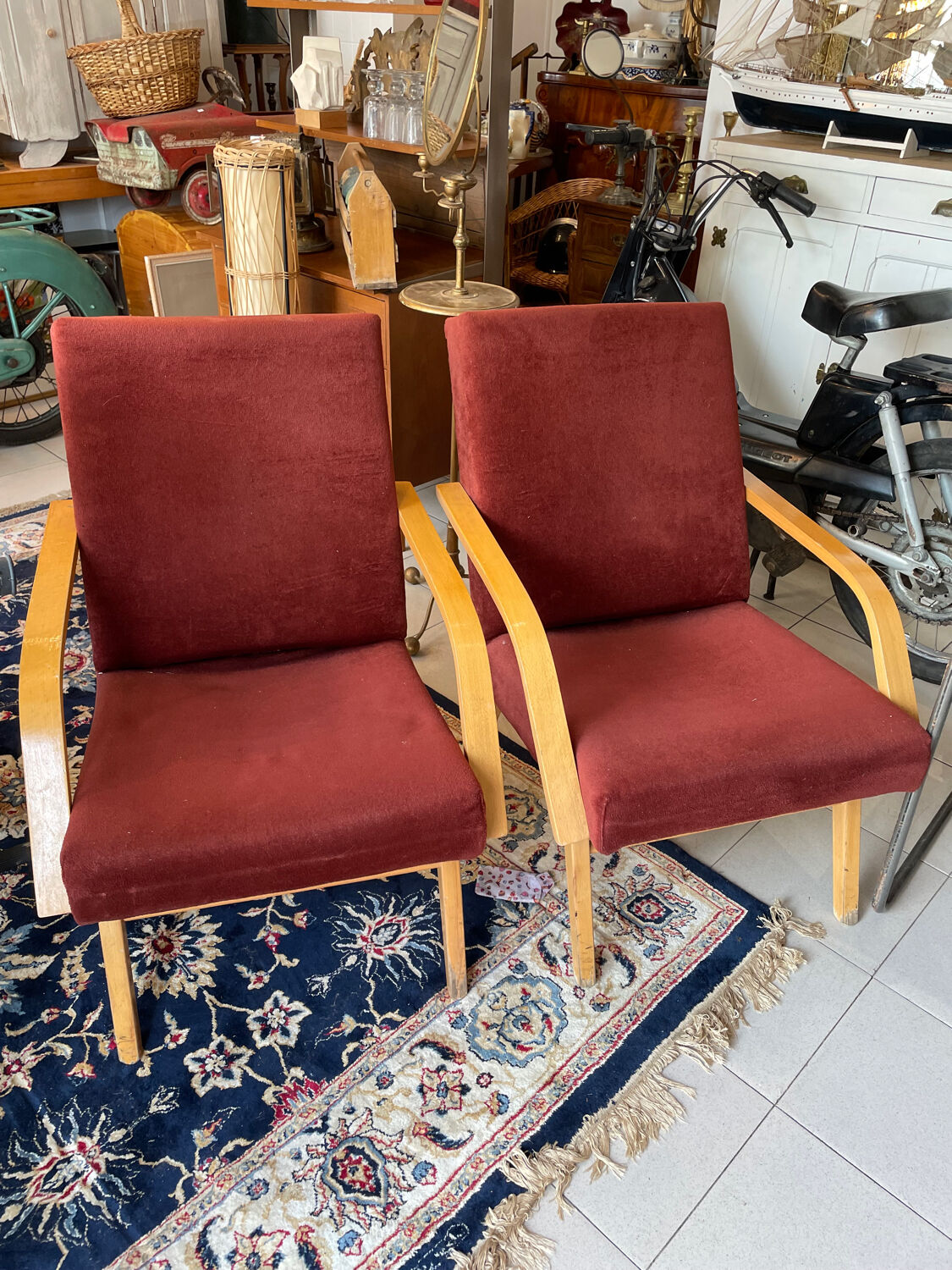 Burgundy Scandinavian armchairs