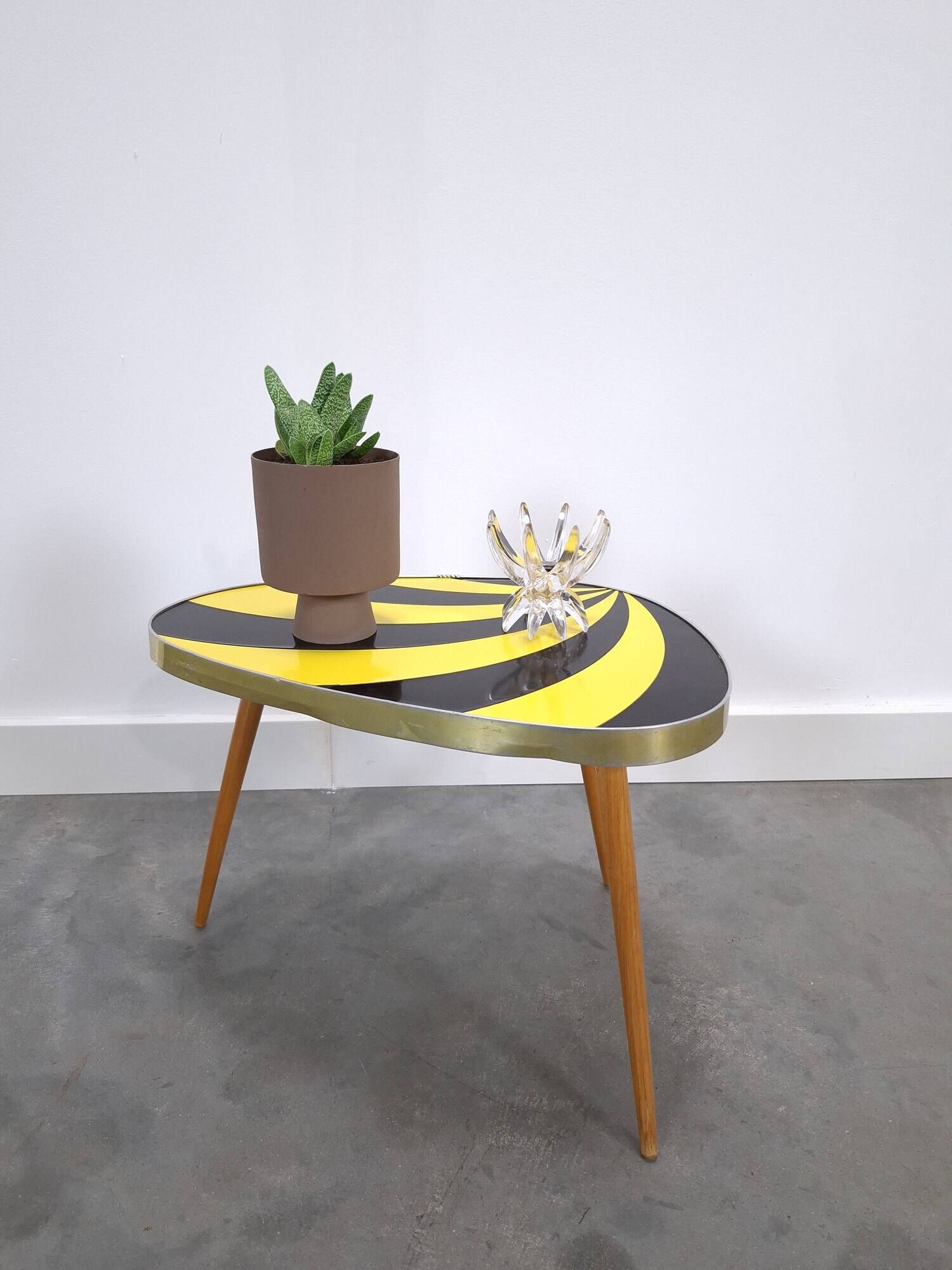 Vintage 1950s black and yellow striped formica table, plant table.