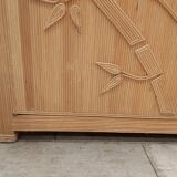 Vintage wicker sideboard with flowers