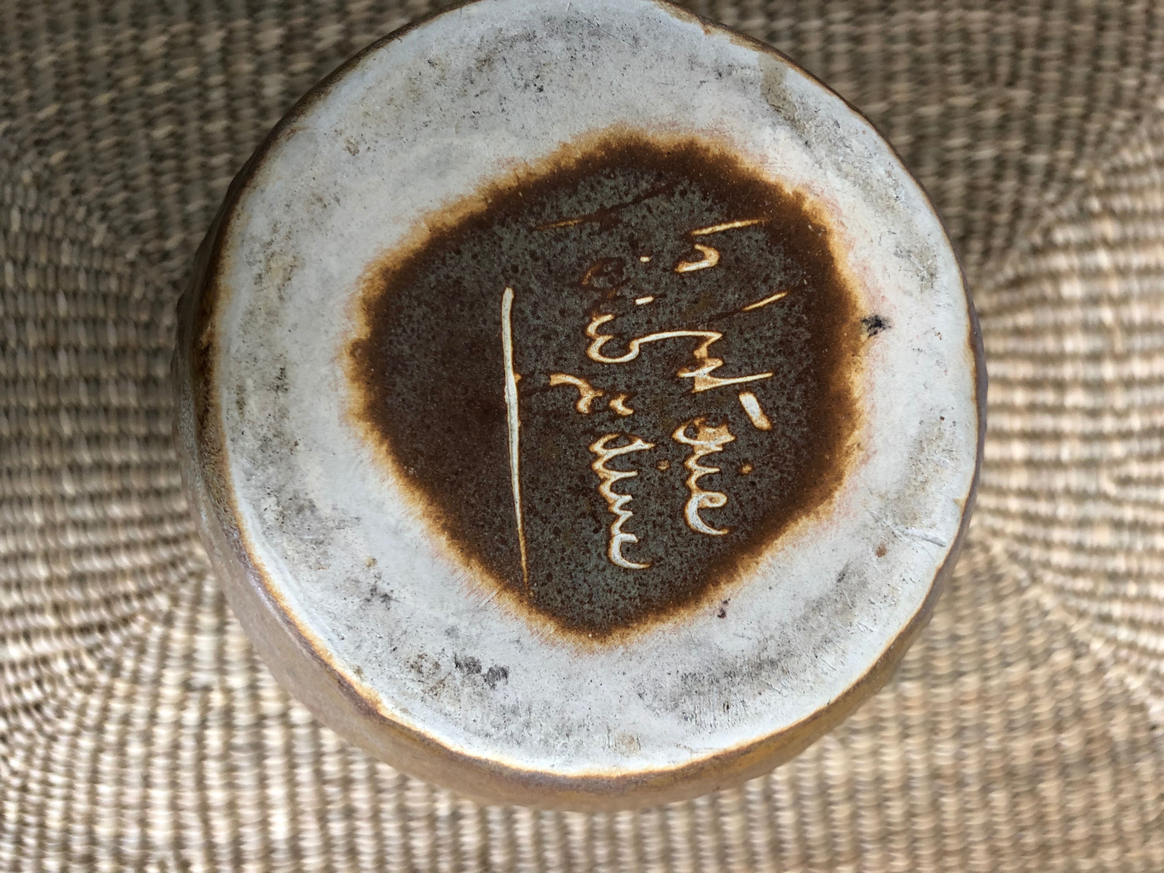 Sandstone pitcher signed the périgordine pottery