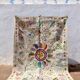 White suzani kilim rug with embroidered multi-colored patterns