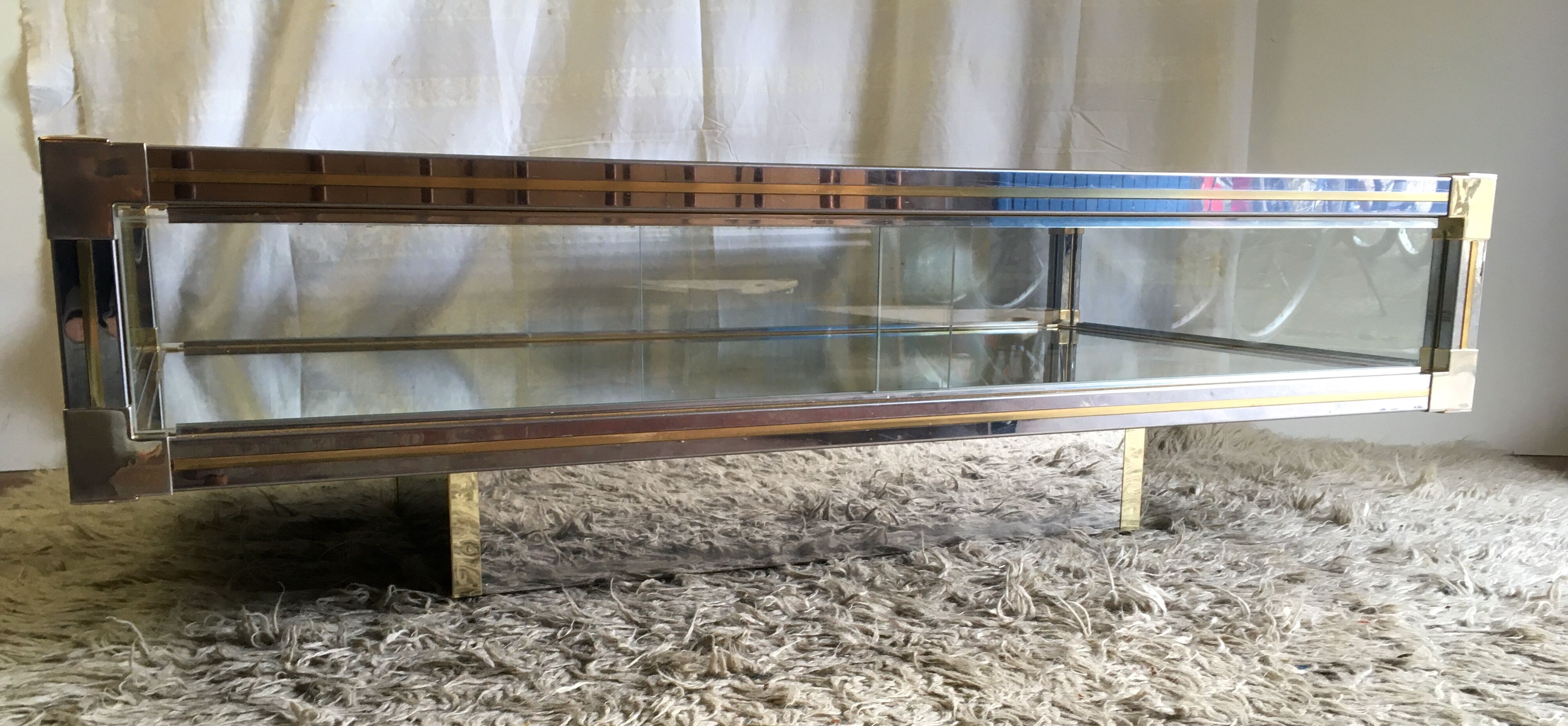 Glass and gold glass and metal coffee table 70
