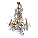 Lustre ancien à 8 bras de lumière à pampilles en bronze et cristal