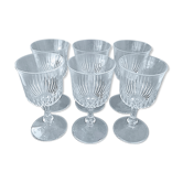 Suite of six glasses of red wine on foot