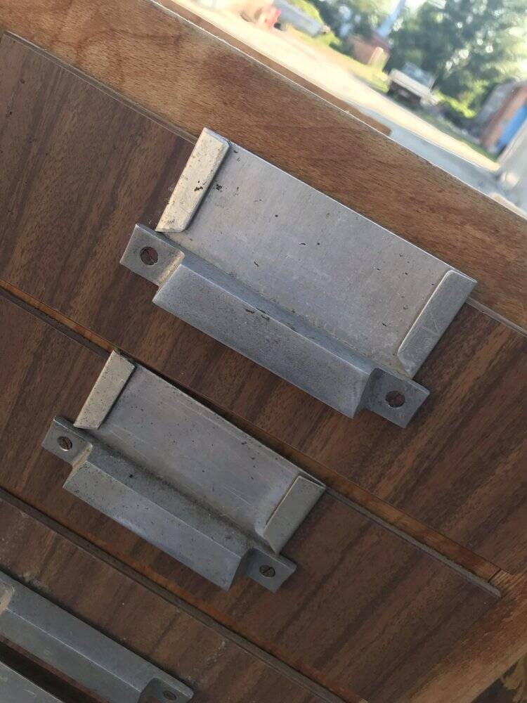 Brown wooden industrial wardrobe, multiple drawers, 1950s, workshop storage, Czech Republic.