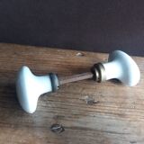 White porcelain door knob handles