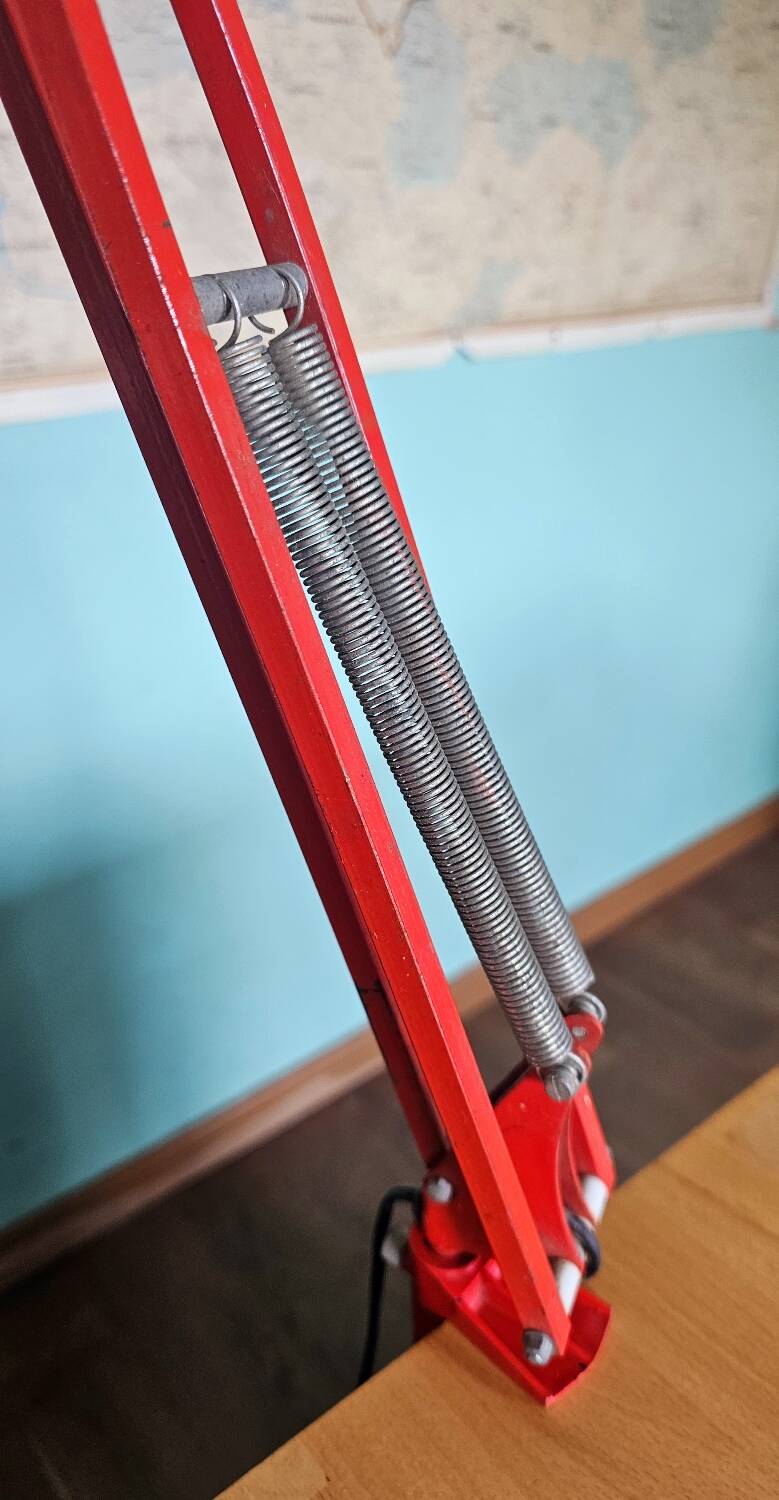 Red articulated workshop lamp