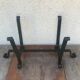 Ancient cast iron log carrier