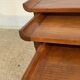 Set of three nesting low tables in a Japanese style, made of mahogany.