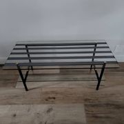 Vintage coffee table in glass and mirror strips.