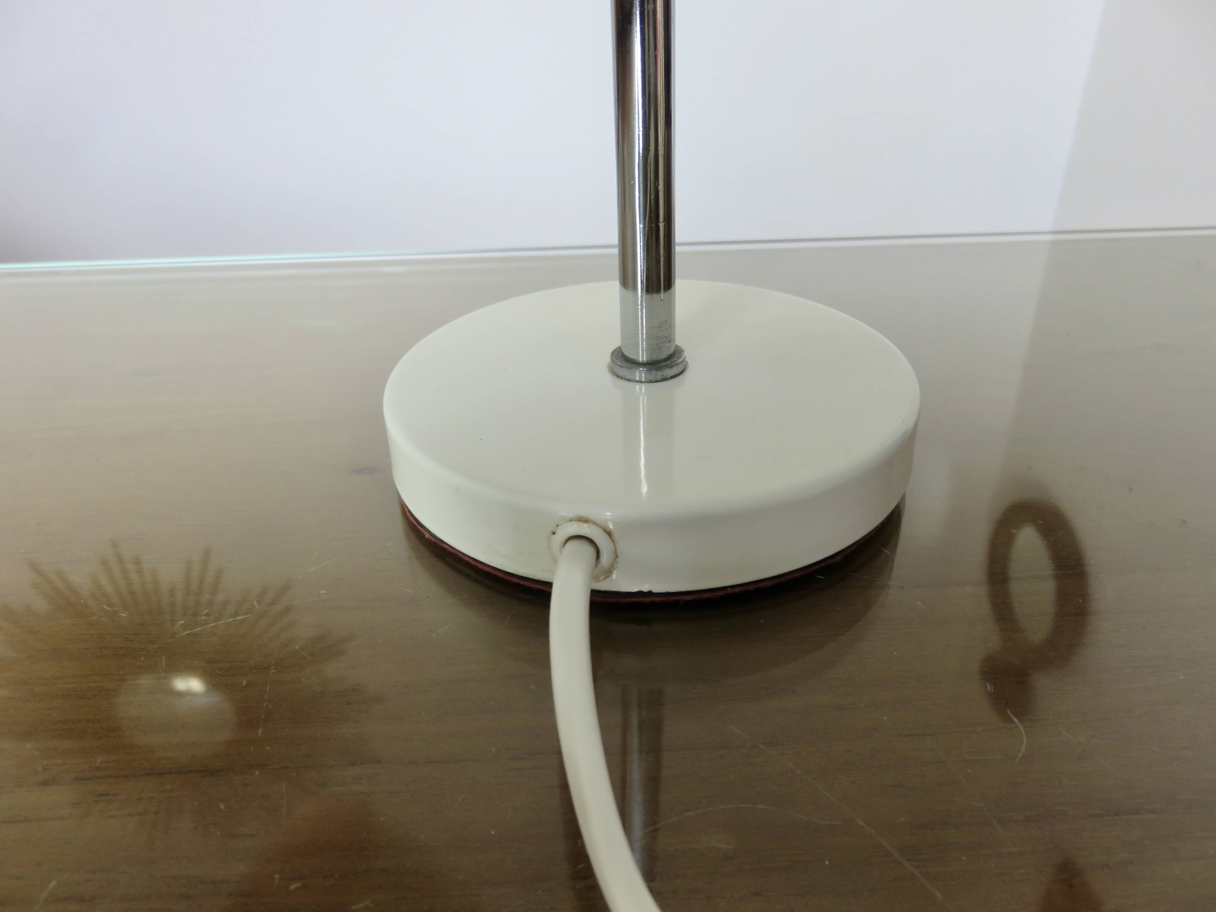 Small Italian lamp with a ball joint, chrome metal and lacquered metal, 60s 70s.