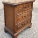 Vintage bedside cabinet with three drawers in moulded wood, Louis XV style.