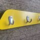 Duo of asymmetrical Formica coat racks from the 60s