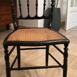 Cane chair in turned and blackened wood