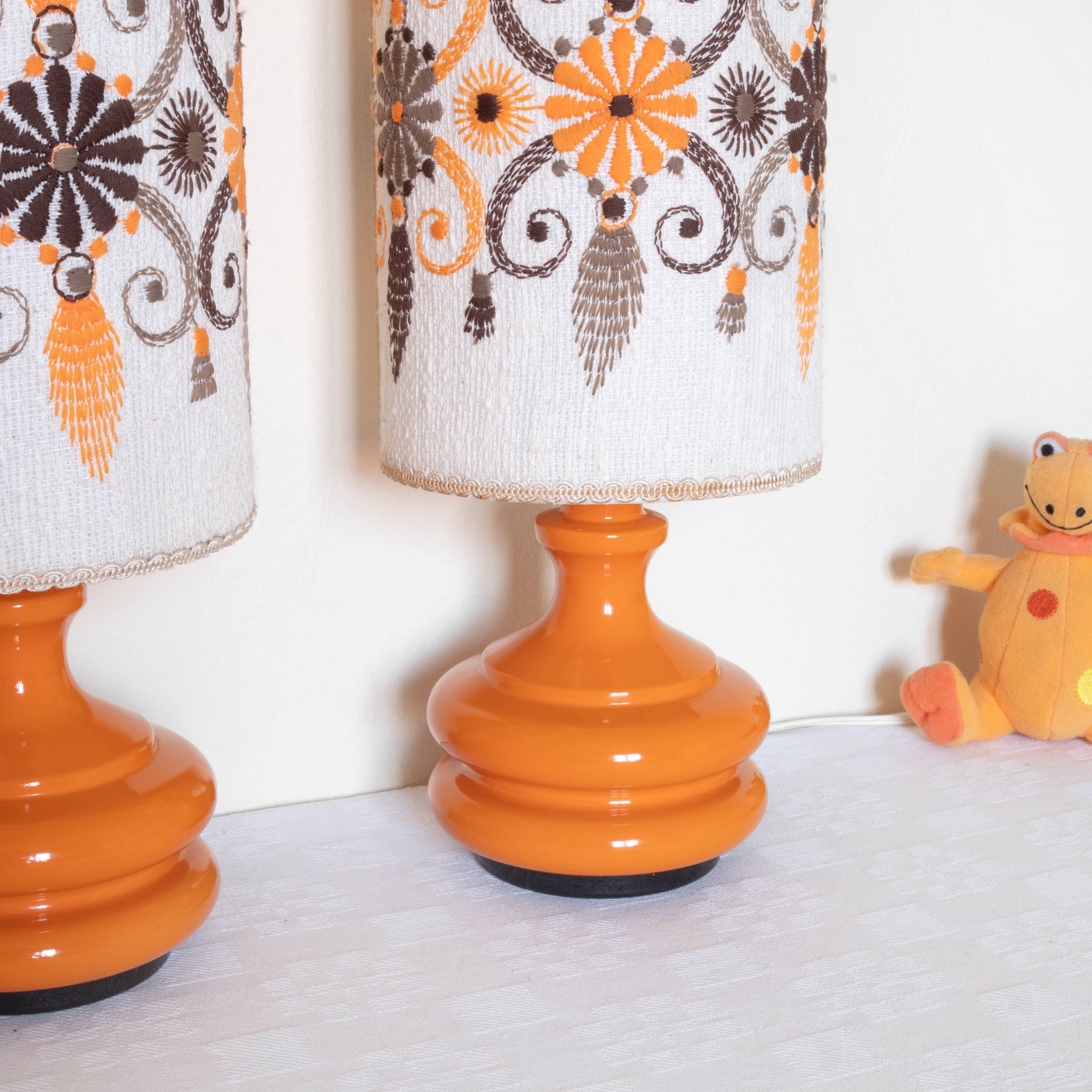 Pair of embroidered orange lamp