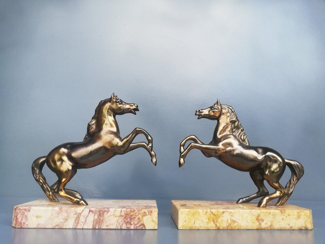Pair of art deco bookends in bronze and marble