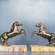 Pair of art deco bookends in bronze and marble