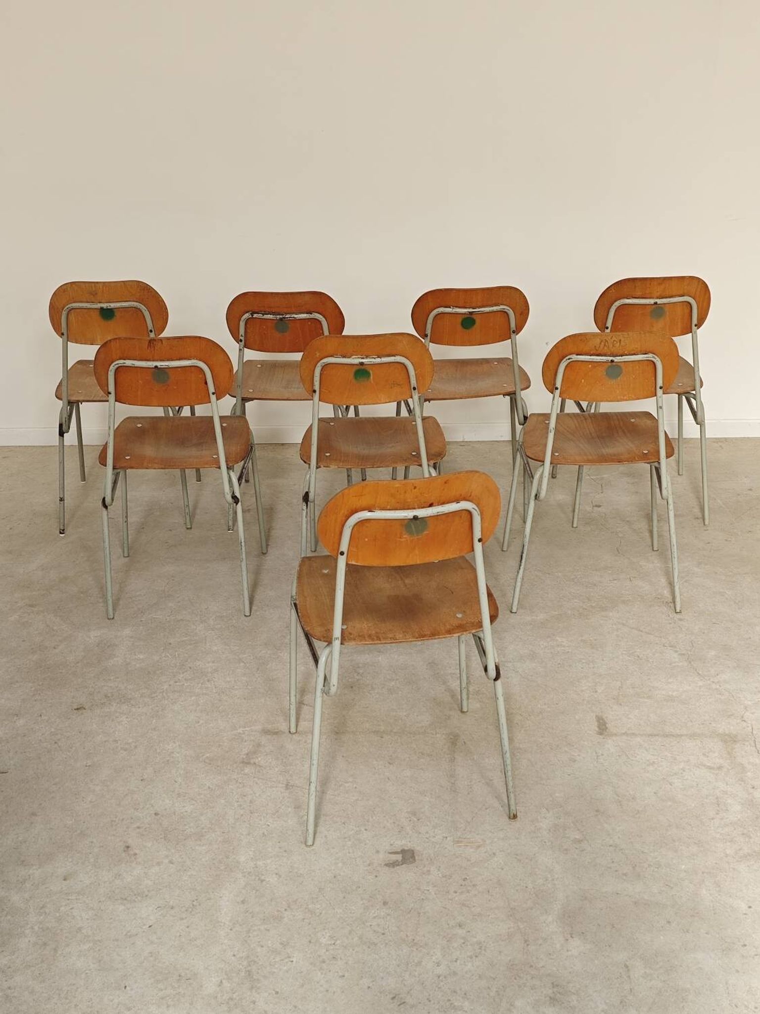 Set of 8 metal and wood school chairs  
Ex Czechoslovakia 1960