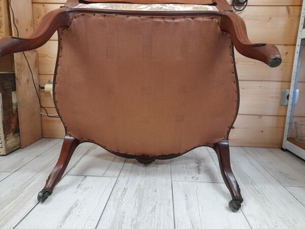 Paire de fauteuils style régence