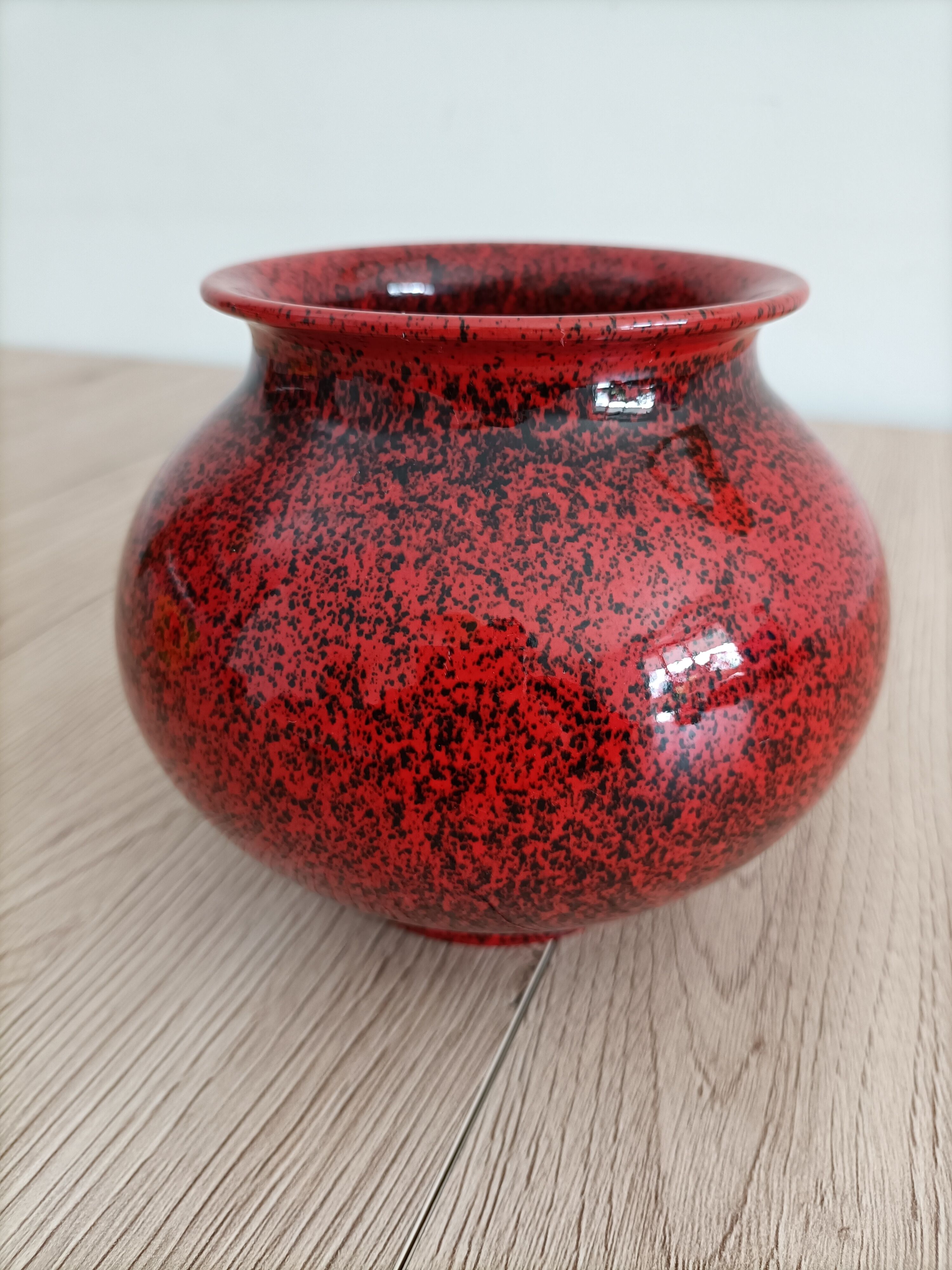 Red and black ceramic vase or pot cover
