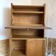 1950s oak secretary with sliding doors