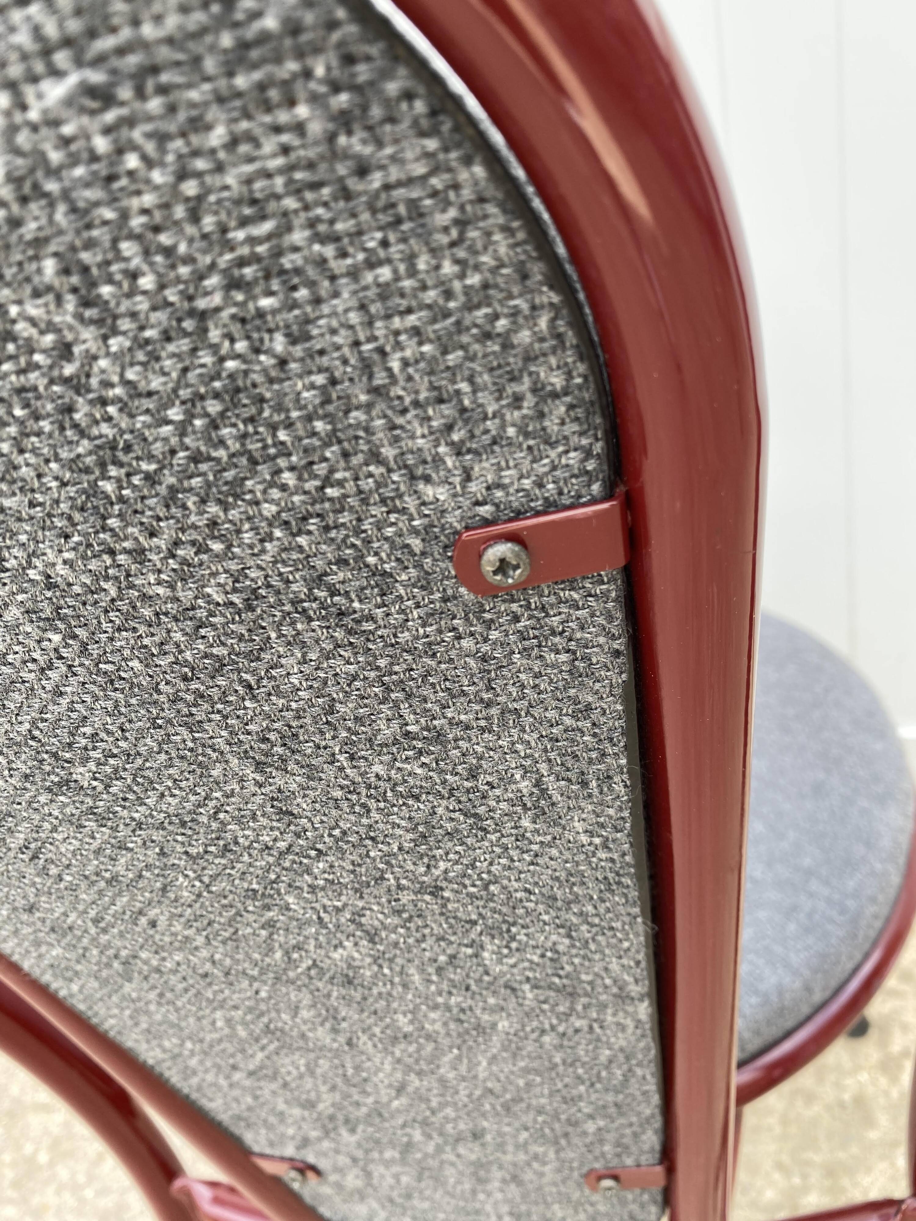 Metallic burgundy bistro chair for restaurants and communities with gray fabric