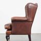 Brown leather wingback Chesterfield armchair