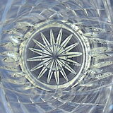 Conical carved crystal vase