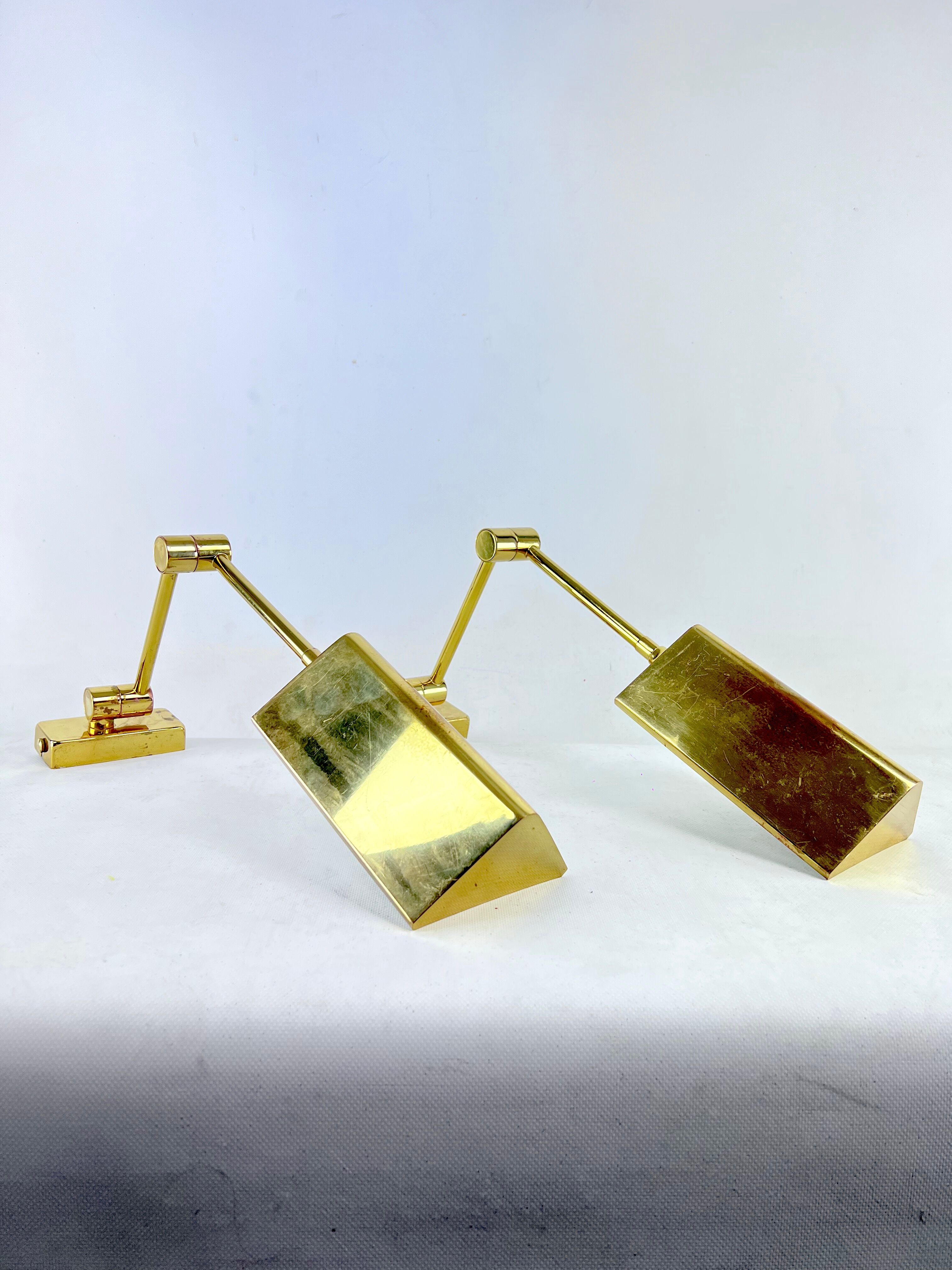 Postmodern pair of articulated brass wall lamps by Baulmann Leuchten. Germany 1980s