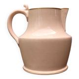 Antique pitcher in pink ceramic