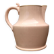 Antique pitcher in pink ceramic