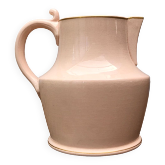 Antique pitcher in pink ceramic