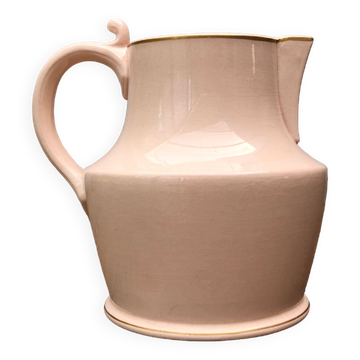 Antique pitcher in pink ceramic